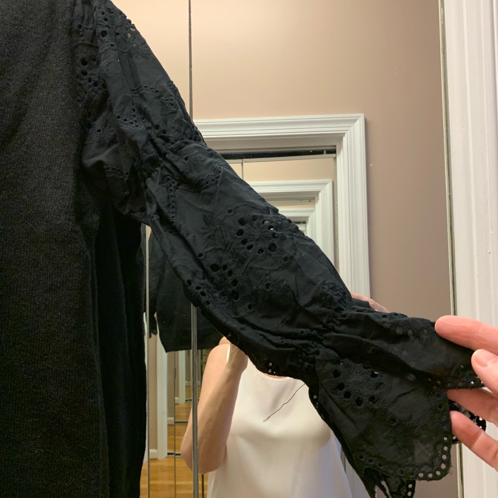 NWT BIBI Black sweater with eyelet sleeve. Size L